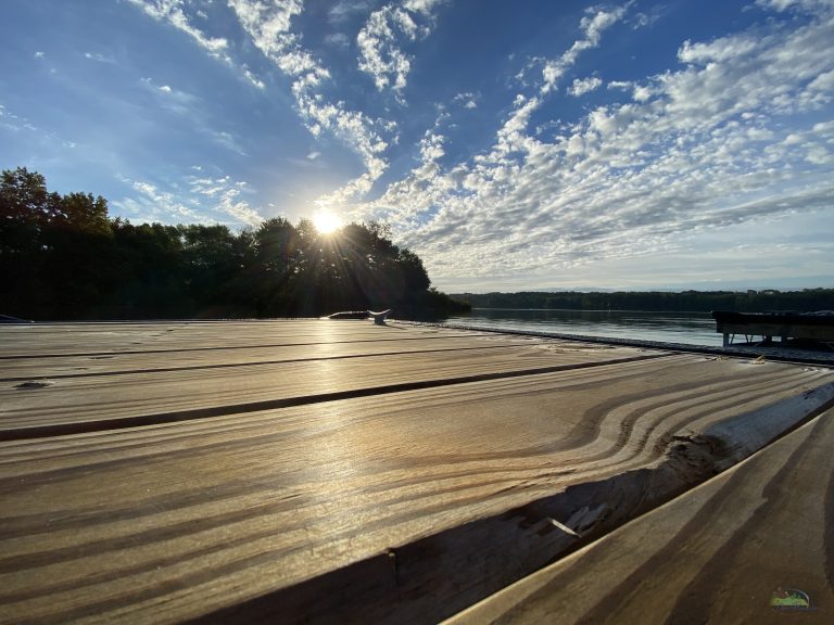 Atwood Lake with picnic table and sunny blue sky