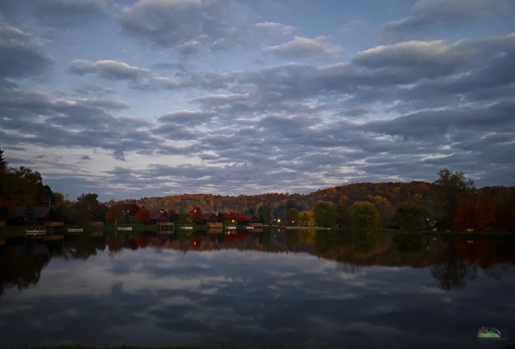 Mohican Lake with fall foliage in background