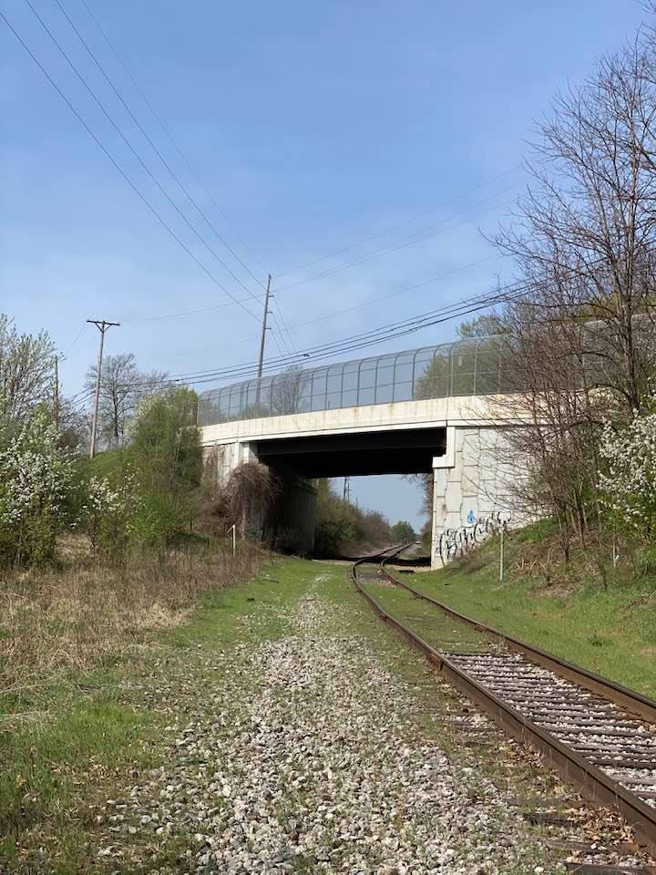 View down the track under the bridge