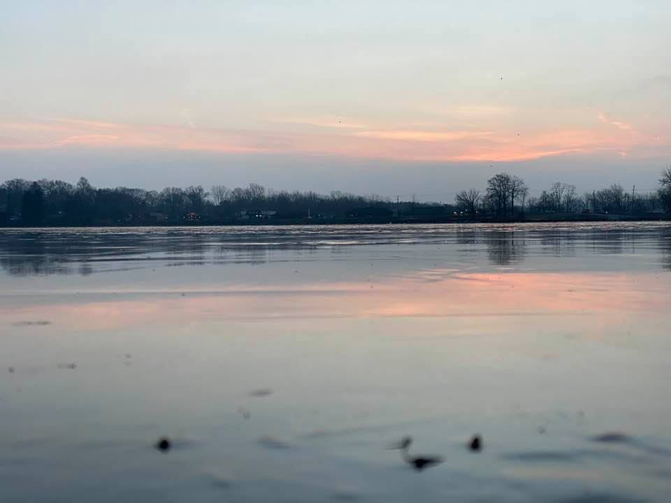Icy lake in the morning sun