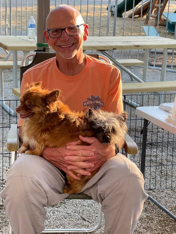 James with two dogs