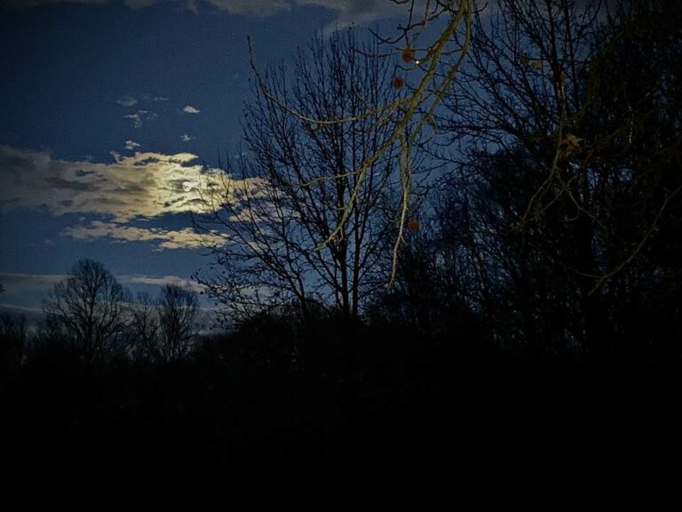 moon behind the clouds