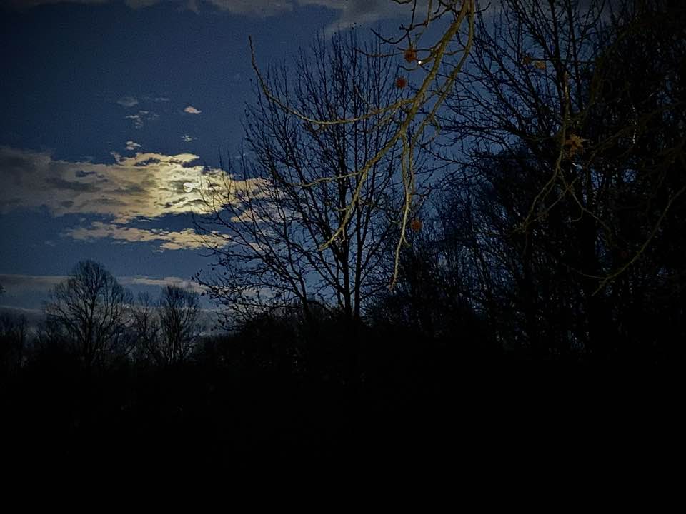 moon behind the clouds