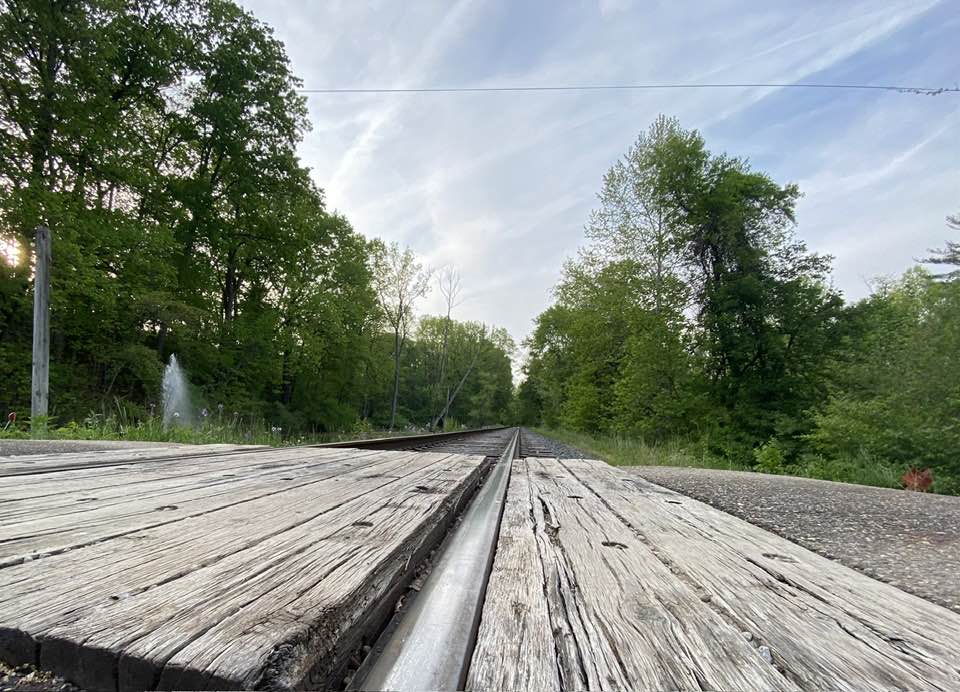 Looking down railway tracks
