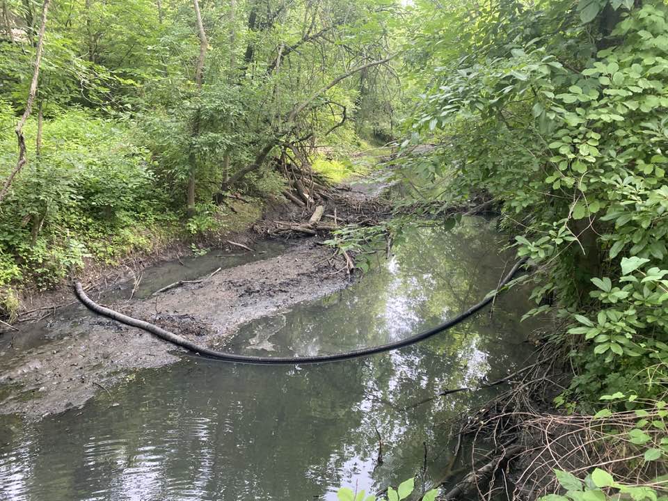 Boom on the river to collect trash