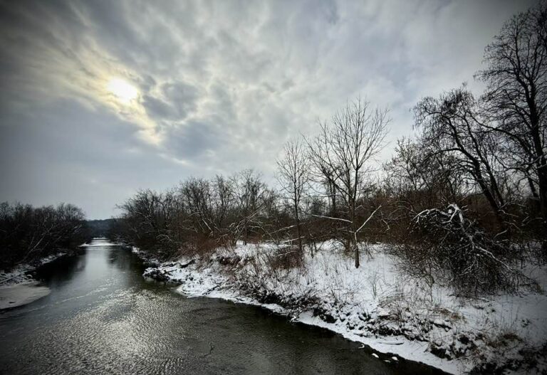 Tuscarawas river surrounded by snow